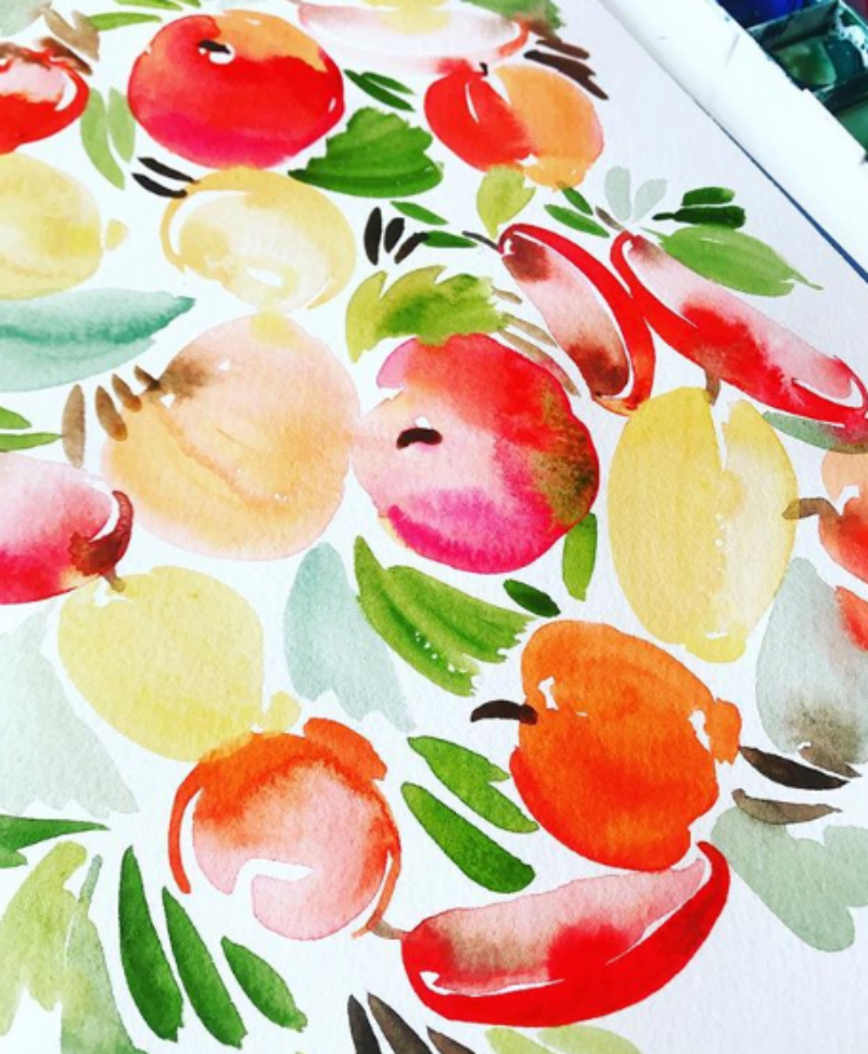 Bright watercolor fruit and leafy shapes painted in loose washes of red, orange, yellow, and green, showing how watercolor and masking fluid can create crisp white highlights and playful negative space.